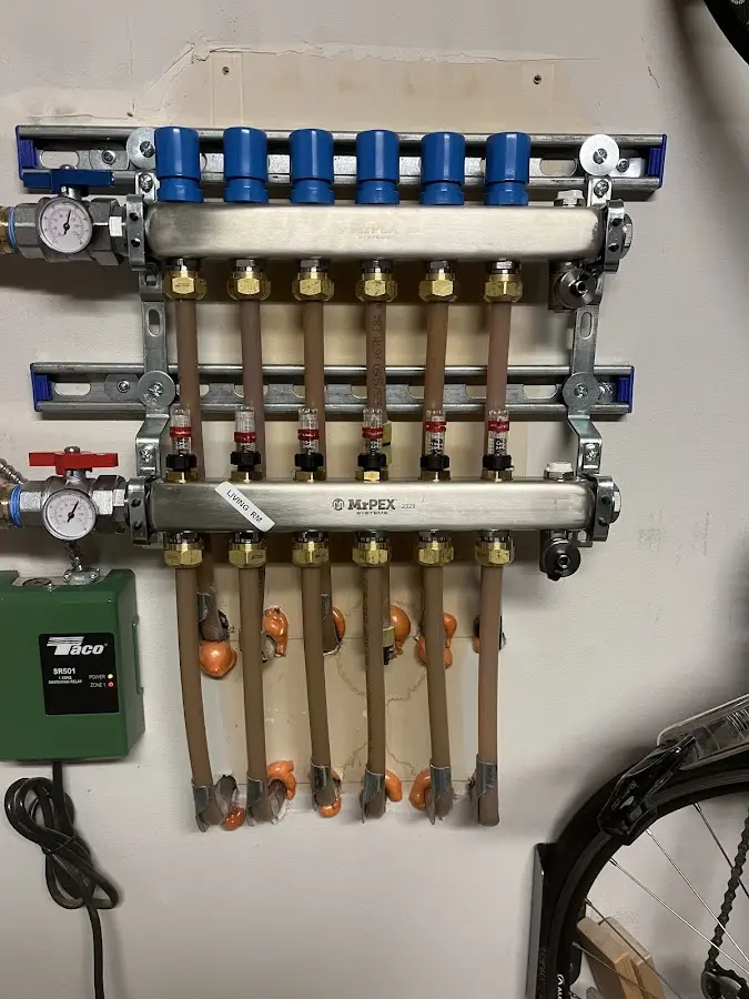 Plumber performing Leak Detection at a residential property in Windsor Locks